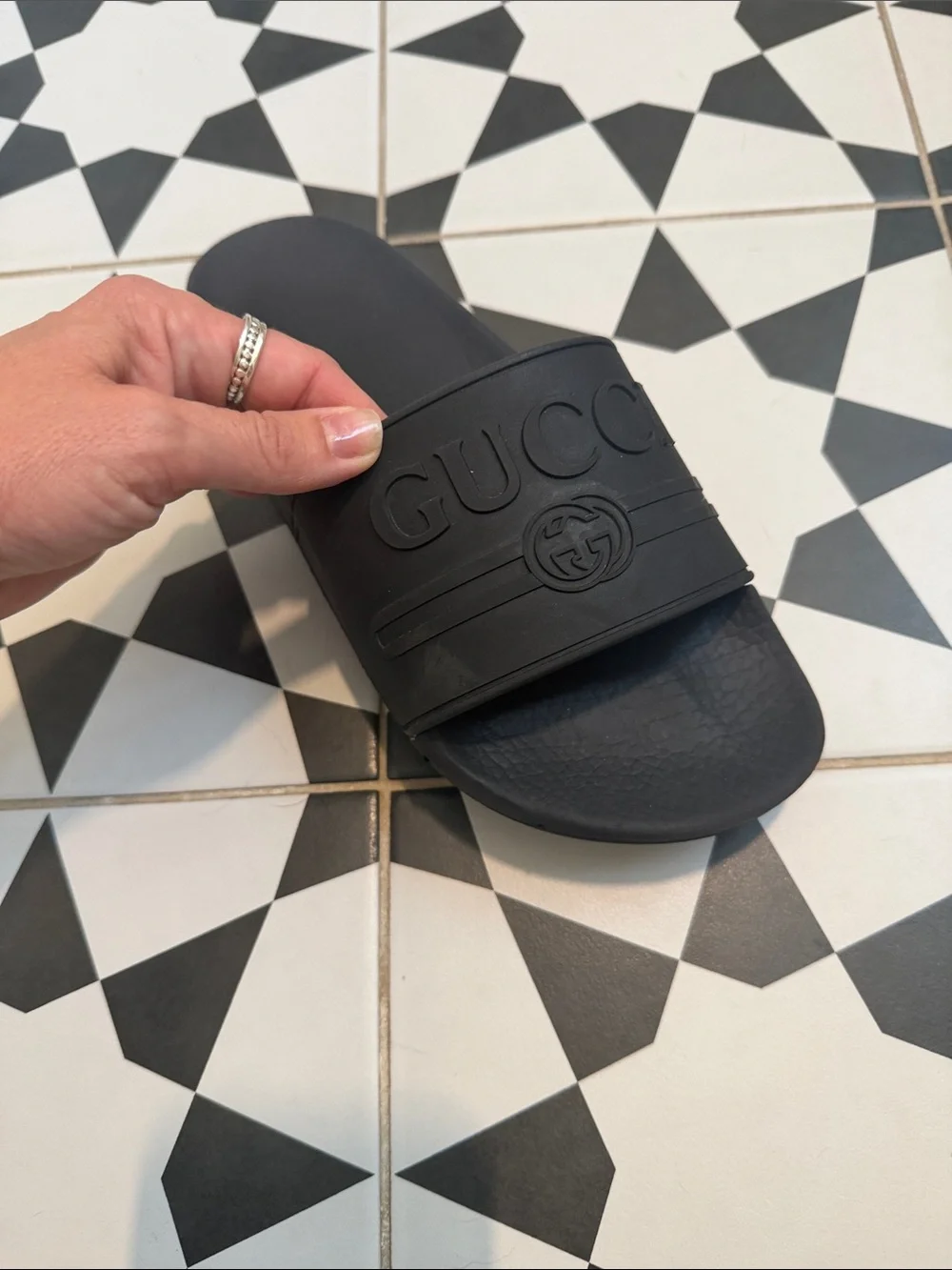 Gucci Black Embossed Logo Rubber Slide Sandals